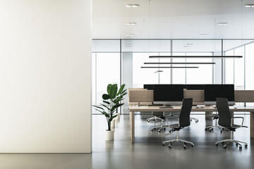 Aufkleber - Modern glass coworking office interior with empty white mock up place on wall, panoramic windows and city view, furniture, equipment and computer monitors. 3D Rendering.