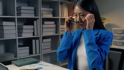 Poster - Asian young beautiful joyful woman smiling while working with laptop in office