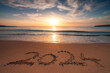 New year 2024 morning over sandy beach, beautiful sea sunrise