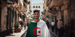 Algerian man draped in Algeria flag in Alger street
