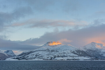 Wall Mural - Winter light over the landscape in Lurøy at the Helgeland coast, Nordland, Norway