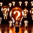 © Kheng Guan Toh - Glowing light bulb with question mark, indicating curiosity and questioning knowledge
