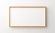 Blank Wooden Frame On A White Wall.