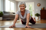 Mature woman staying fit at home, engaging in health-promoting exercise and stretching