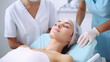 © dinastya - Woman at cosmetic procedures lying in the office of cosmetologist or plastic surgeon. Facial care, skin improvement, facial cleansing, cosmetologist services in beauty clinic.