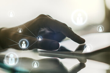 Poster - Social network media concept with finger presses on a digital tablet on background. Double exposure