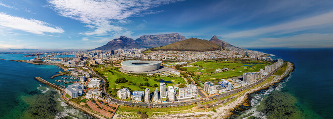 Wall Mural - cape town aerial panorama from the ocean, entire town skyline with the famous stadium, table mountain and signal hill
