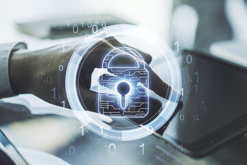 Poster - Double exposure of creative lock hologram with chip and with finger clicks on a digital tablet on background. Information security concept