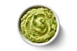 Guacamole in souce bowle on white background, top view	