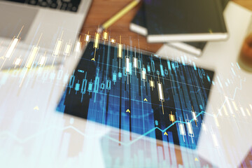 Poster - Double exposure of abstract creative financial diagram and modern digital tablet on background, banking and accounting concept