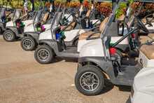 Row Of Golf Carts At Golf Course.