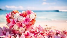 Heart Shaped Bouquet Of Pink Frangipani And White Roses On Sandy Shore. Clear Blue Sky And Calm Sea Horizon Evoke Romantic Beachside Wedding Theme, Love, Valentine's Day. Holiday Vacations, Honeymoon
