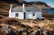 A lovely winter's day by the coast with a white painted croft home