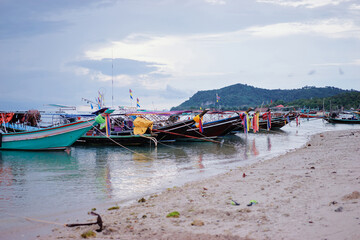 Wall Mural - Beautiful landscape with traditional longtail boat on the beach. Samui, Thailand.