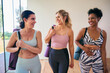 © Monkey Business - Three Mature Female Friends In Fitness Clothing Meeting At Gym Or Yoga Class