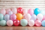 Fototapeta  - colorful balloons arranged in a frame on a wooden background,