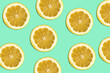 lemmon pattern on bright green background. Minimal flat lay food texture. Summer abstract trendy fresh concept.