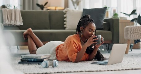 Aufkleber - Laptop, typing and woman laying on the floor in the living room of modern apartment. Technology, elearning and young African female university student studying on a computer in the lounge at home.