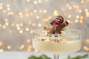 Wall Mural - Gingerbread cookie man in a Christmas cocktail