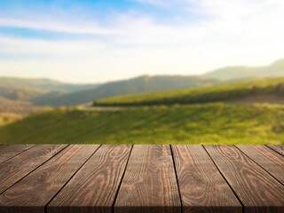 Wall Mural - the empty wooden table top at farm background
