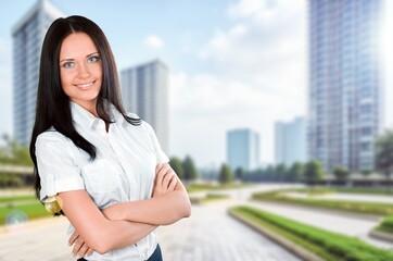 Beautiful business woman with arms folded