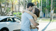 © Krakenimages.com - Beautiful couple smiling confident hugging each other at street