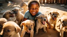 A Young Boy Grins With Excitement As He Plays With A Playful And Energetic Litter Of Puppies.