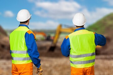 Wall Mural - Male architects meeting at big construction site