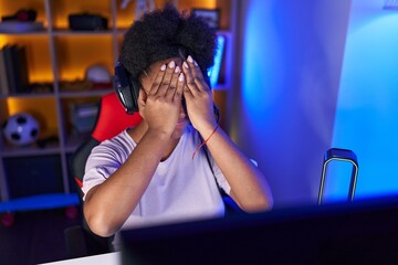 Poster - African american woman streamer stressed using computer at gaming room