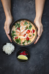 Wall Mural - Tom yum with seafood, rice, lemon wedge and hot pepper.