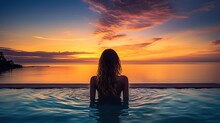 Woman On Summer Vacation Holiday Relaxing In Infinity Swimming Pool With Blue Sea Sunset