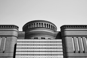 Canvas Print - Tower and wall of a renovated building of an old brewery in the city of Poznan