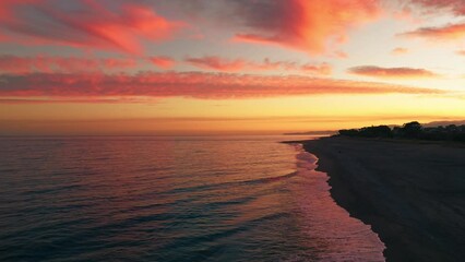 Wall Mural - Red Fired Sunset Clouds On Ocean
