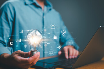 Aufkleber - Hand holding Light bulb, Global Internet connection cloud computing. Business global internet connection application technology, digital marketing, Financial and banking, Digital link tech, big data.