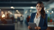 © seesulaijular - Beautiful female manager sitting with laptop create her project. Blurred office background with male and female employees.