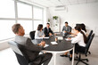 © Pixel-Shot - Business colleagues working at table in office