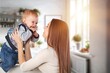 © BillionPhotos.com - Young mom hold cute happy baby