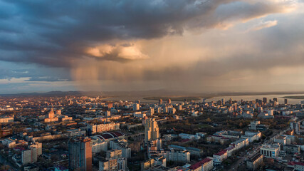 Khabarovsk city top view sunset beautiful clouds in the rain