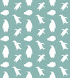 Vector seamless pattern of flat hand drawn penguin silhouette isolated on mint background