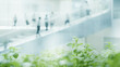 light blurred green background eco business center, office building inside interior, silhouettes of people blurred in motion