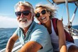 © Alexandr - A happy mature man and a woman are relaxing on a yacht at sea. The concept of an active lifestyle in old age.