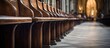 Shallow depth of focus highlights Saint Michael church's wooden choir benches in Ghent, Belgium.