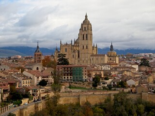 Wall Mural - To the north of Madrid lies the absolutely picturesque city of Segovia, Spain. It makes the perfect day trip from Madrid to wander its quaint streets and admire its incredible Roman aqueduct