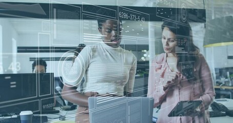 Wall Mural - Animation of data processing over diverse female colleagues discussing work in office