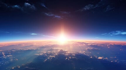 Wall Mural - Sunrise view of the planet Earth from space with the sun setting over the horizon
