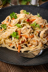 Canvas Print - Fried noodles with chicken and vegetables.