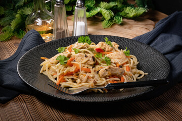 Wall Mural - Fried noodles with chicken and vegetables.