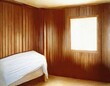 Watercolor of Corner of a wooden master bedroom featuring a 
