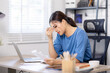 © David - Frustrated desperate millennial woman checking bills for payments, holding receipts, getting upset about overspending, too high mortgage, insurance fees. Homeowner analyzing costs, expenses, budget
