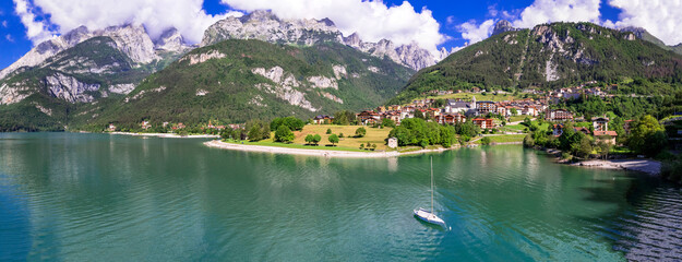 Wall Mural - Most scenic mountain lakes in northern Italy - beautiful Molveno in Trento, Trentino Alto Adige region. aerial drone high angle view.